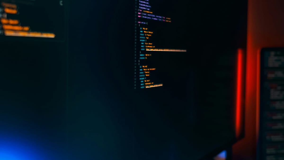Lines of computer code on a screen, representing the Build phase where the platform is engineered