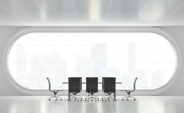 Modern empty meeting room with arch windows overlooking a city skyline, the space where Discovery conversations happen